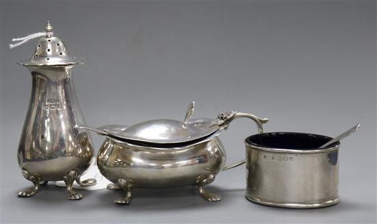 A George V silver three piece condiment set.